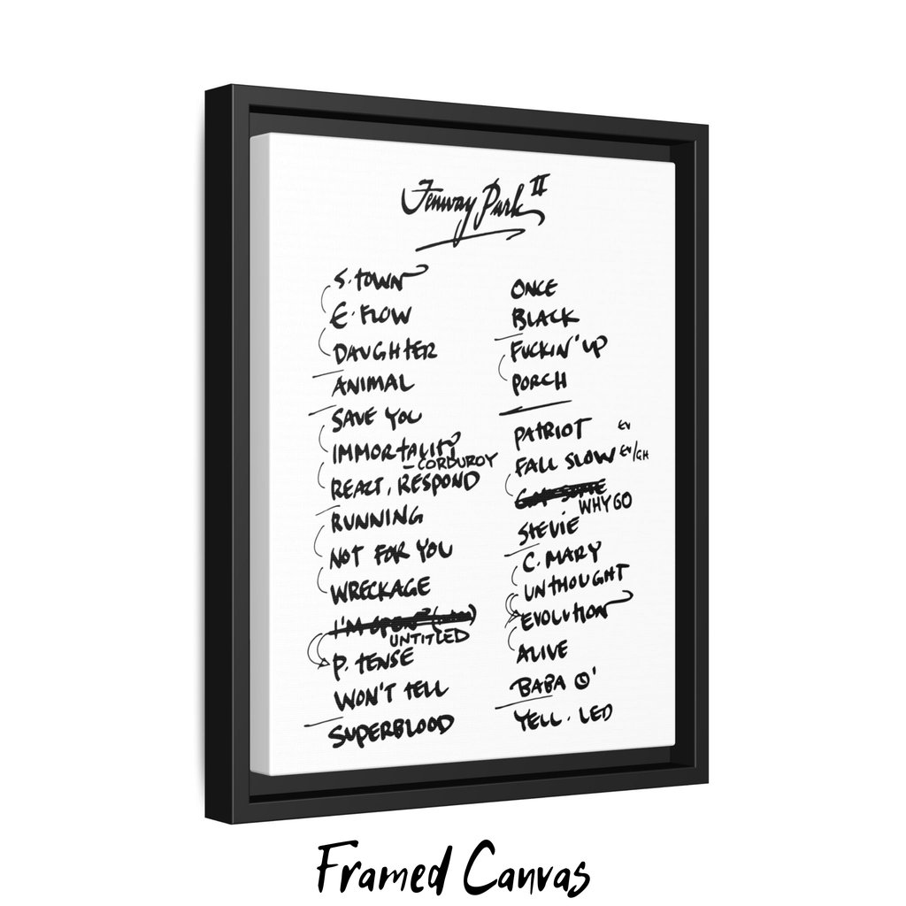 Framed canvas with handwritten setlist on a white background