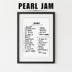 Framed Pearl Jam album tracklist with a plant on a white surface