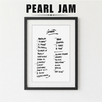 Framed list of Pearl Jam album tracklist with a plant on a white background